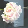 Modern clear acrylic invitation featuring elegant white script text, part of a minimalist wedding invitation suite with mailing envelopes.
