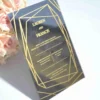 Luxury silver mirror acrylic wedding invitation featuring a geometric border and custom gold silk screen printing.