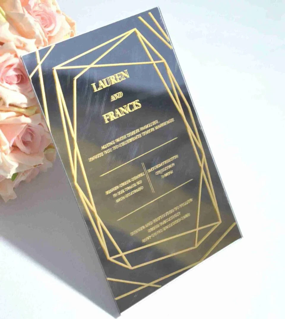Luxury silver mirror acrylic wedding invitation featuring a geometric border and custom gold silk screen printing.