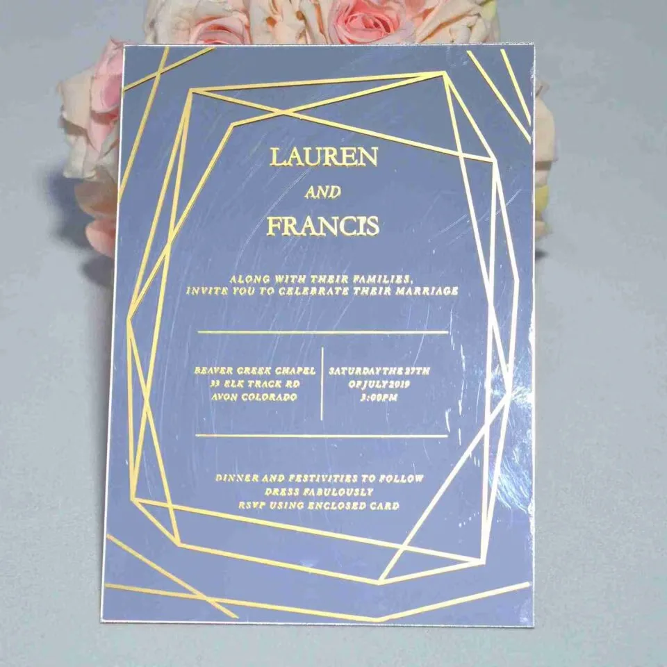 Luxury silver mirror acrylic wedding invitation featuring a geometric border and custom gold silk screen printing.